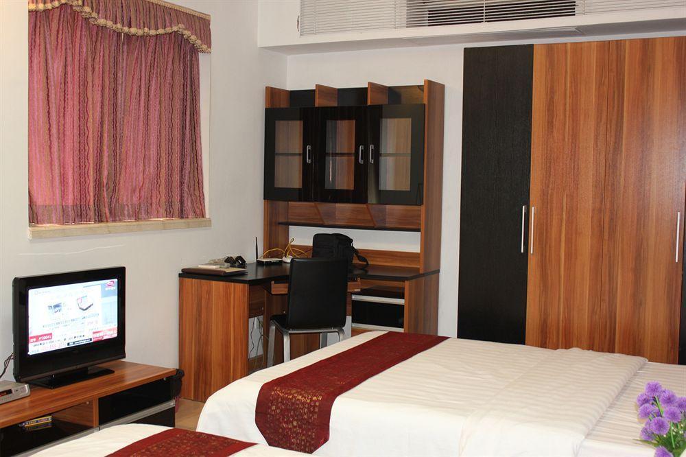 She & He Service Apartment Huifeng Guangzhou Buitenkant foto